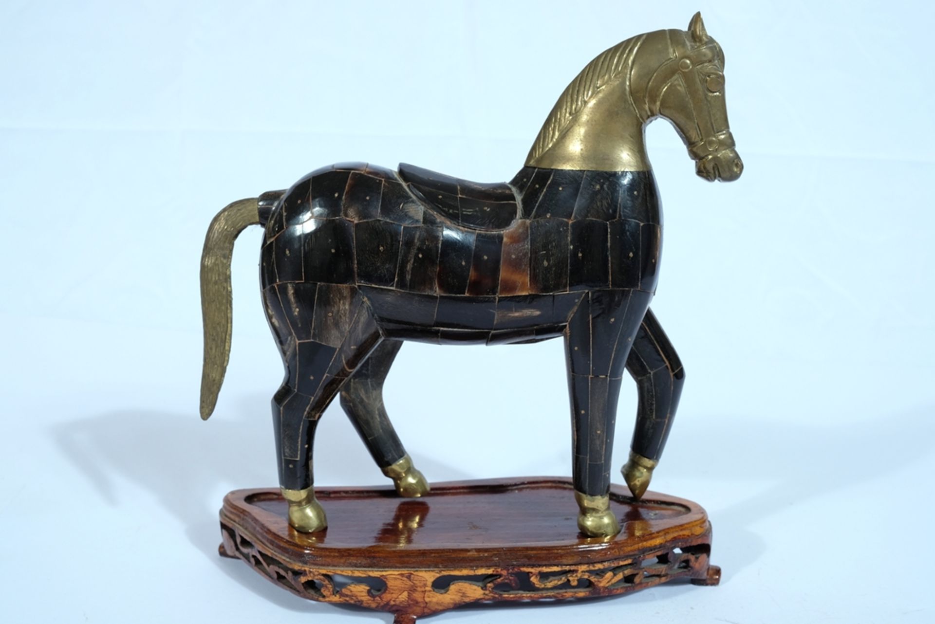 Unknown (20th century) Horse made of wood, horn and brass. 