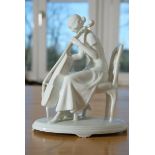 Porcelain figure Cello player, Augarten Vienna, cello bow missing, 20 cm high