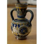 Doulton Lambeth vase, British. Vase with two handles, relief decoration. 1891-1910. height: 13 cm.