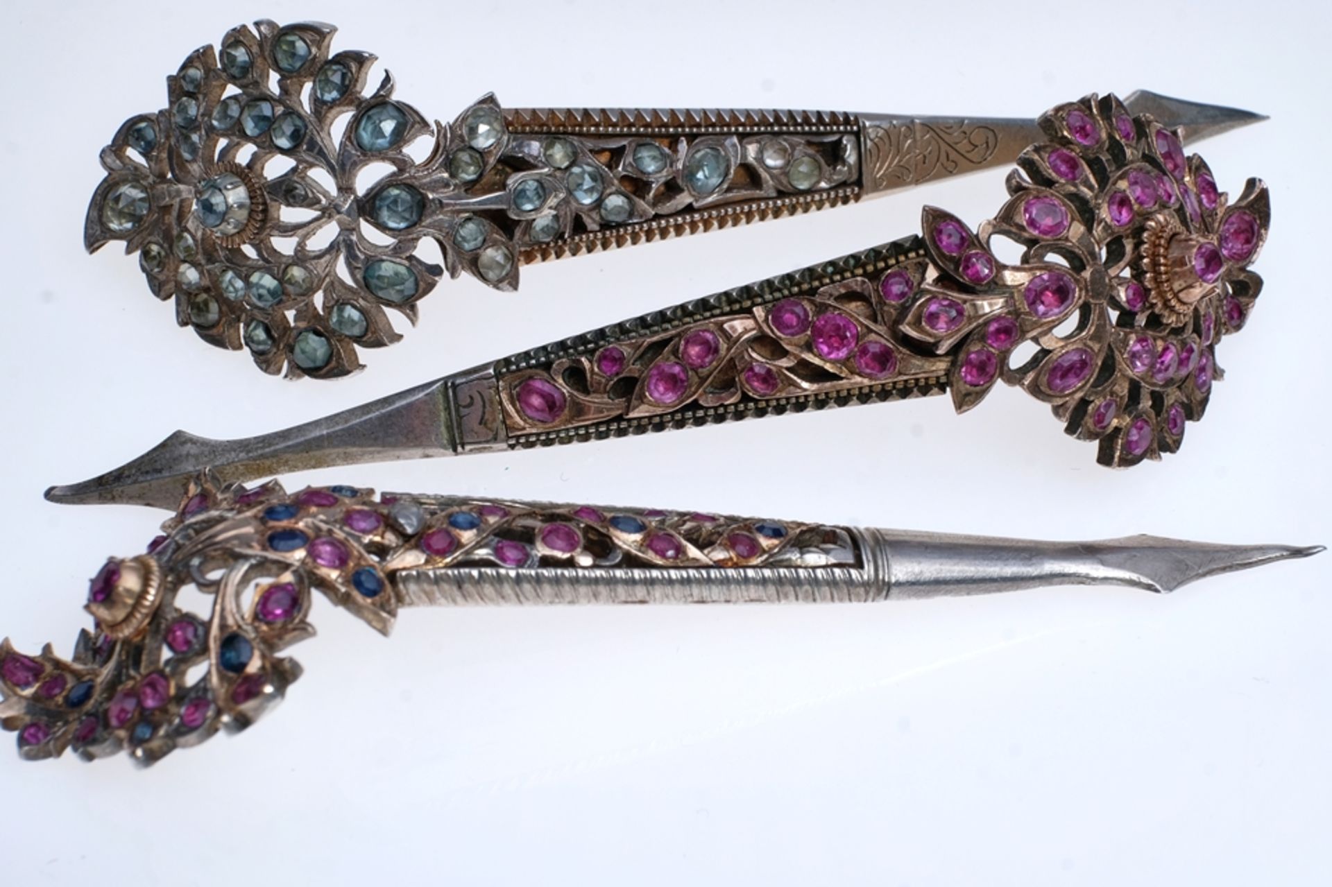 Three hairpins, Hairpins, all around 11 cm and decorated with vegetal motifs, India 19th century