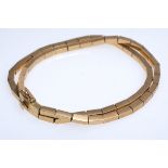 Articulated gold bracelet, 750 GG, two articulated strands that join at the clasp. Push-in clasp wi