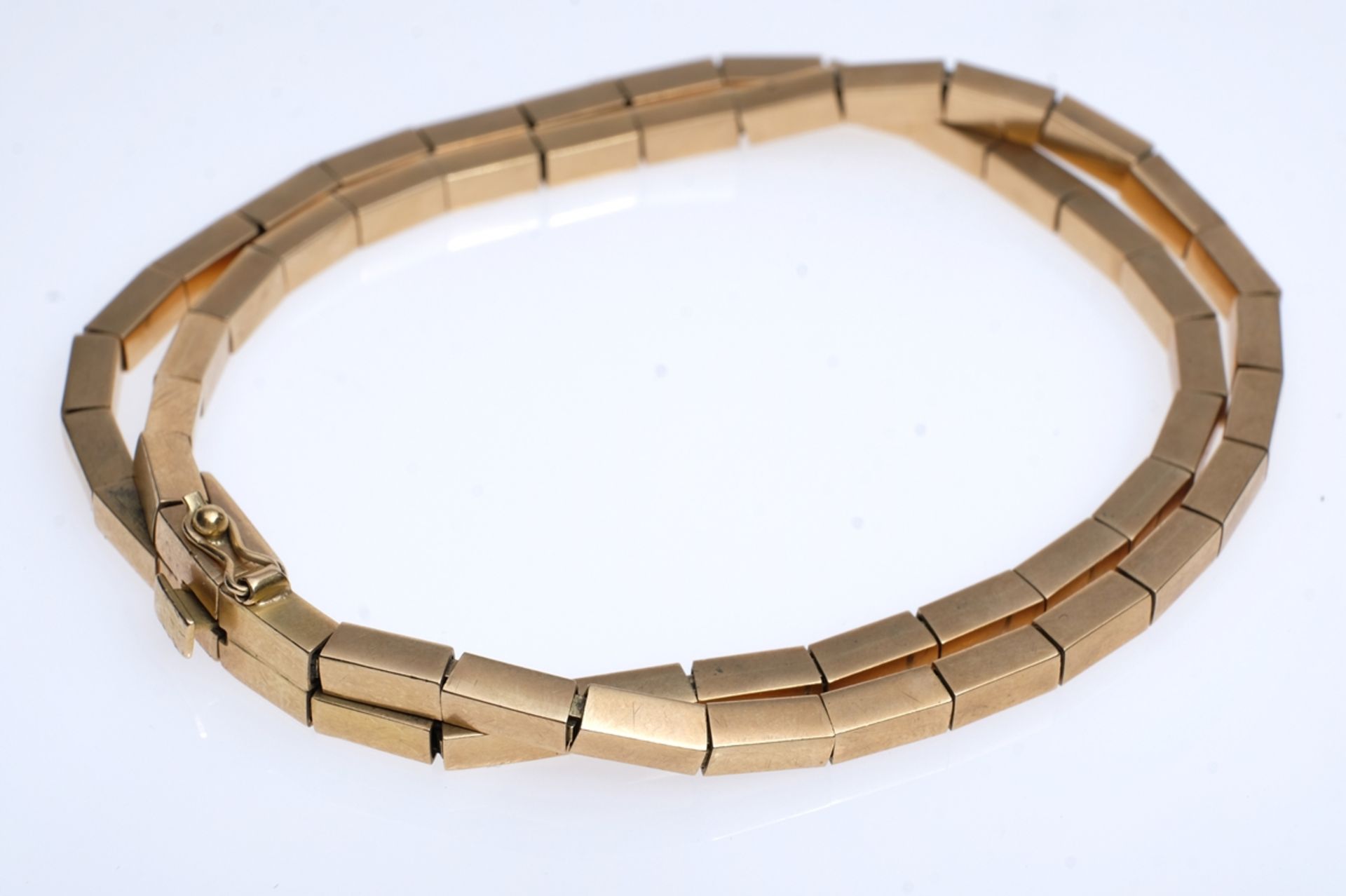 Articulated gold bracelet, 750 GG, two articulated strands that join at the clasp. Push-in clasp wi