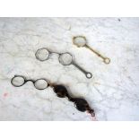 Drei antike Brillen klappbar