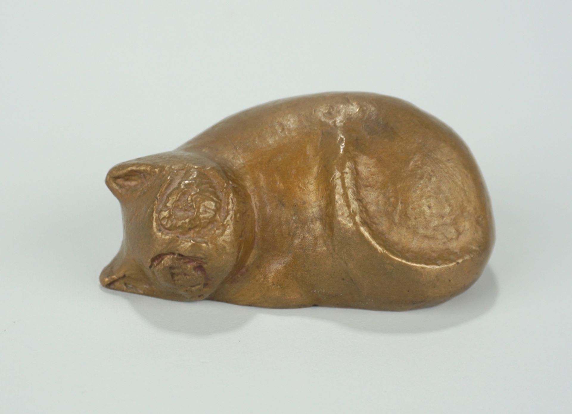 Buschkötter, Hannelore (geb. 1923, gest.2013, Berlin), "Liegende Katze", Bronze