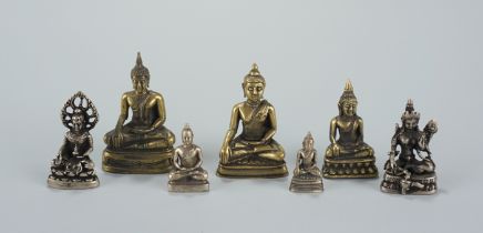 7 Miniatur-Buddhas, Messing, z.T. versilbert, 2.Hälfte 20.Jh.