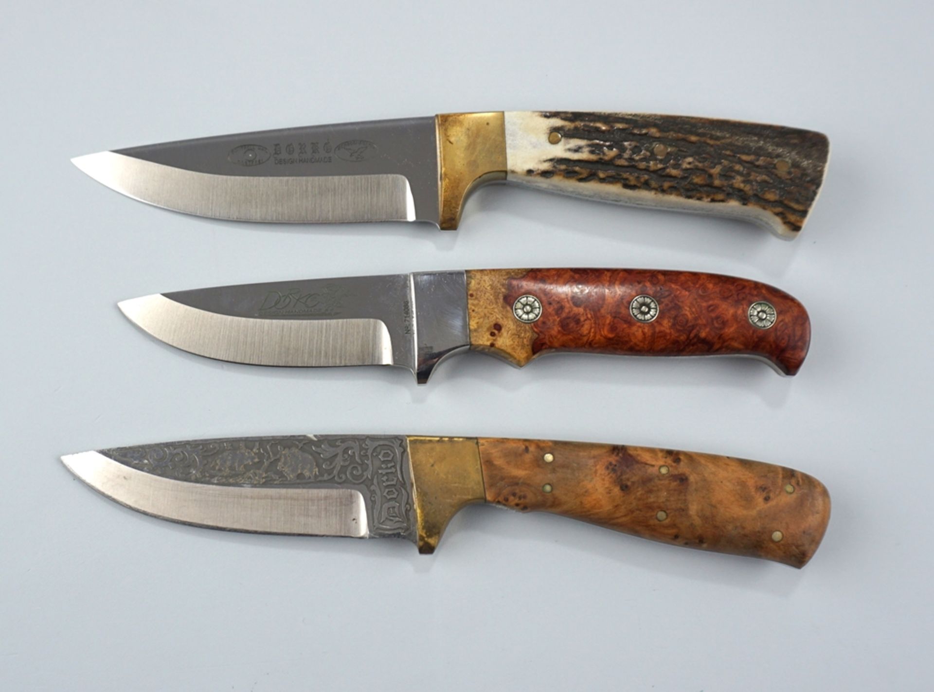 3 Jagdmesser, Dorko, zweimal mit Klingenätzung