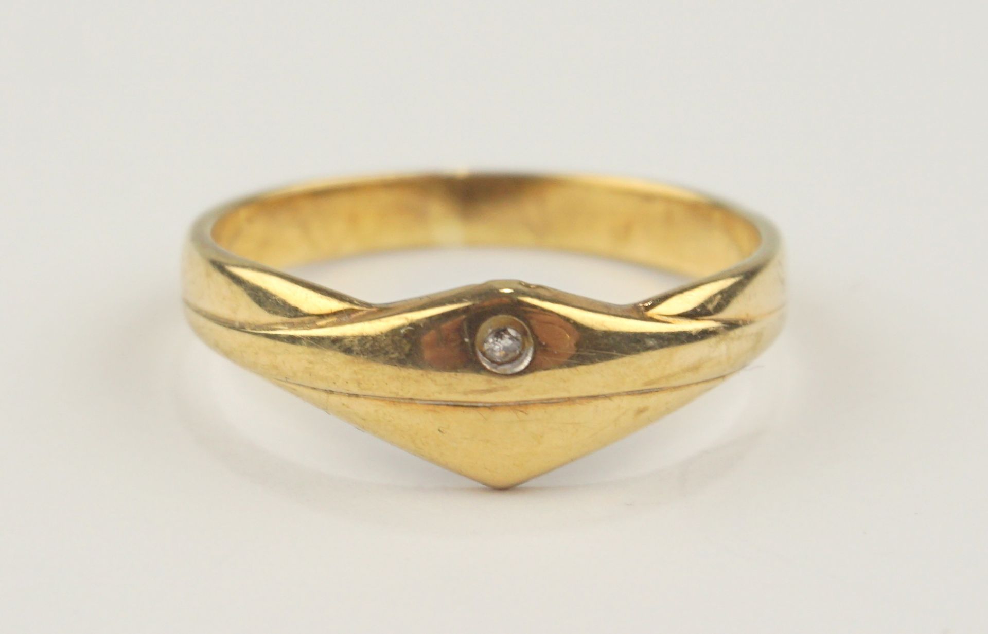 Ring mit kleinem Diamant, gez.0,01ct, 333er Gold