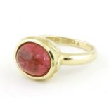 Ring, 585er GG. mit Kunzit Cabochon