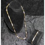 Swarovski Schmuckset, Collier und Arrmband, Gold doublé mit geschliffenen Kristallsteinen