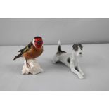 Zwei Porzellanfiguren, Terrier und Vogel