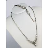 Set: Collier und Armband, graue Perlen, Diamanten, 585er WG, Collier L ca 41 cm, Armband L 15 cm,