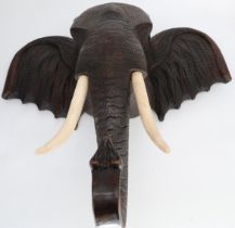 Elefantenkopf, Holz, 75 x 80 x 30 cm. Elephant head, wood, 75 x 80 x 30 cm