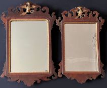 Paar Spiegel, 19. Jh., Holz furniert, mit Vogel im oberen, durchbrochen gearbeiteten Abschluss,