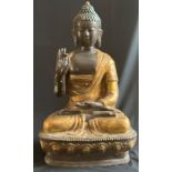 Buddha, Nepal, 20. Jh., Bronze, stellenweise vergoldet, die rechte Hand in abhaya-mudra, die linke