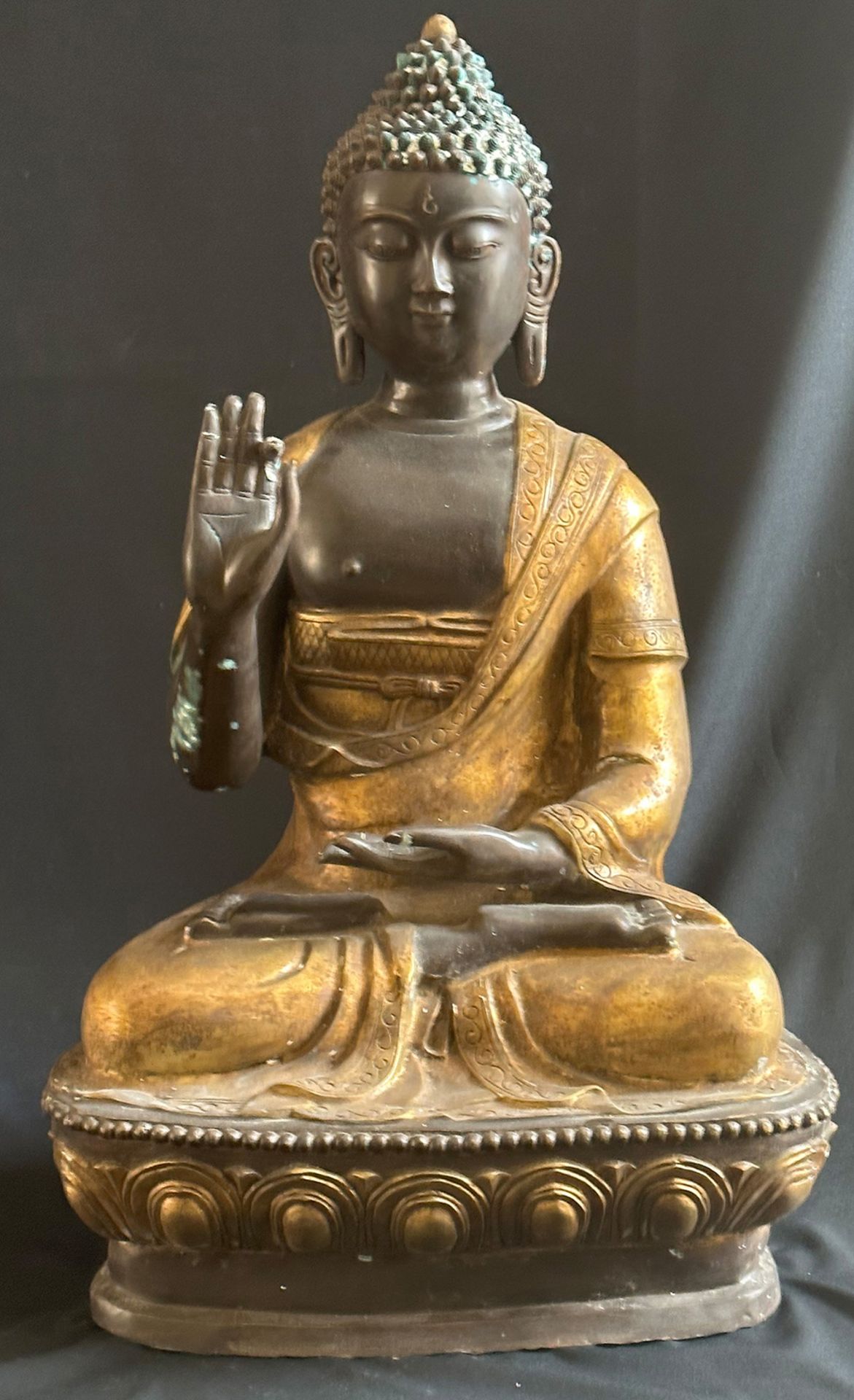 Buddha, Nepal, 20. Jh., Bronze, stellenweise vergoldet, die rechte Hand in abhaya-mudra, die linke