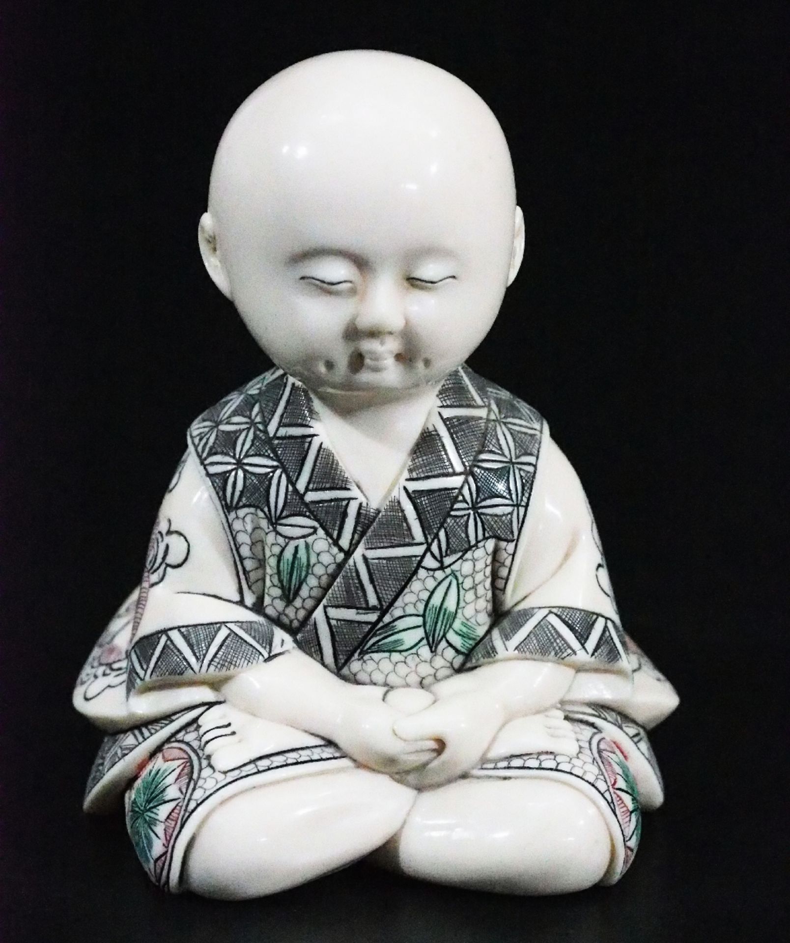 Kind-Buddha meditierend. Asien.