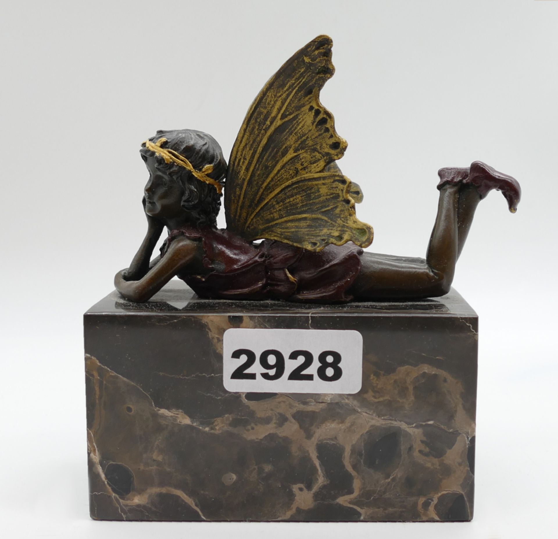 1 Figur Bronze "Liegende Elfe", Replik nach Milo, min. goldstaffiert, H ca. 16cm auf Marmorsockel,