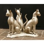 1 Tischfuß nztl.: 3 ägyptische Bastet-Katzenfiguren als Metallsockel ca. H 41cm,
