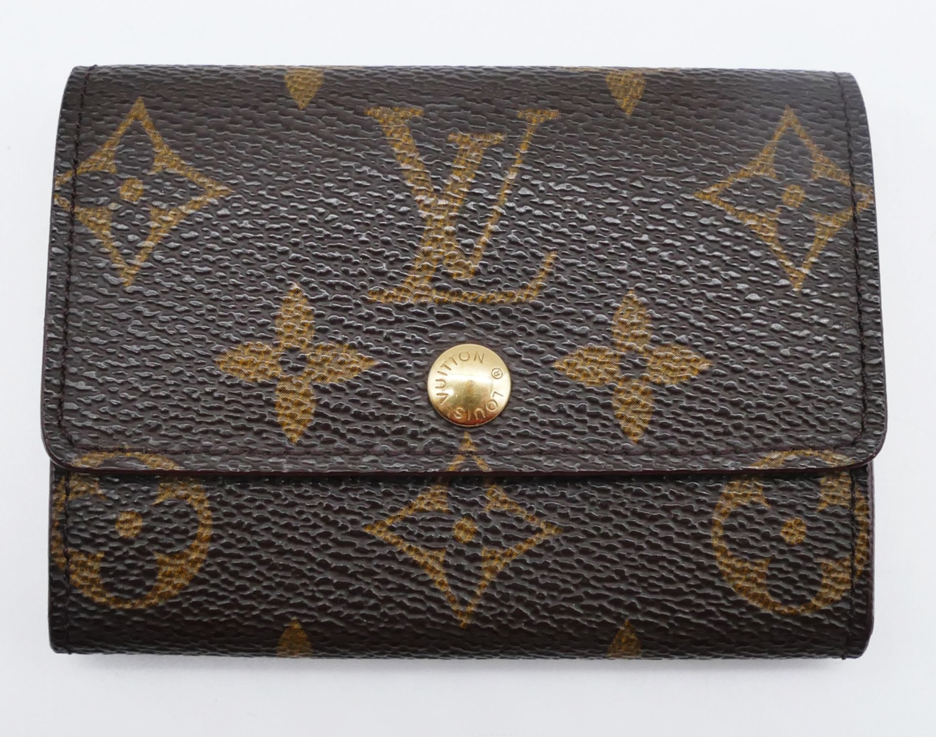 1 kleine Geldbörse LOUIS VUITTON Monogram, Maße ca. 7,5x10cm, Gsp.