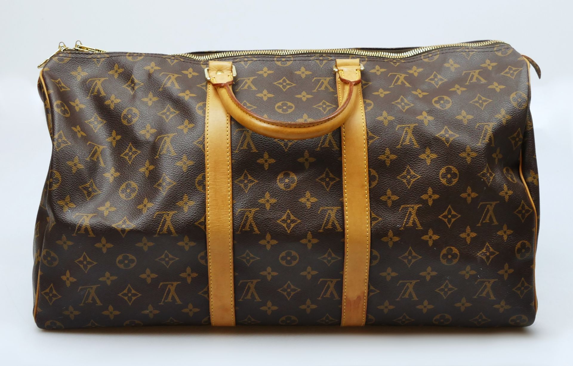 1 Reisetasche LOUIS VUITTON Monogram "Keepall", mit Schloss, B. ca. 50cm, innen sehr gut erhalten, o