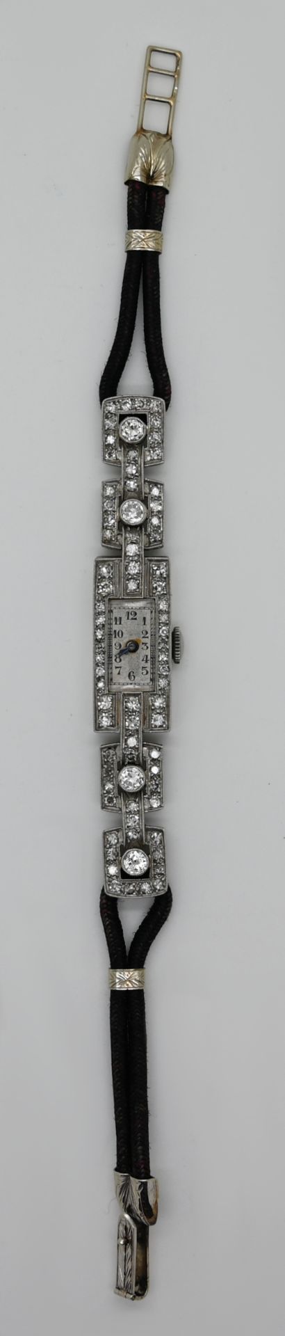 1 Damenarmbanduhr Art déco, mit Brillanten bis zu ca. 0,1ct., mehrfach gestempelt, z.T. "950" (wohl - Bild 2 aus 2