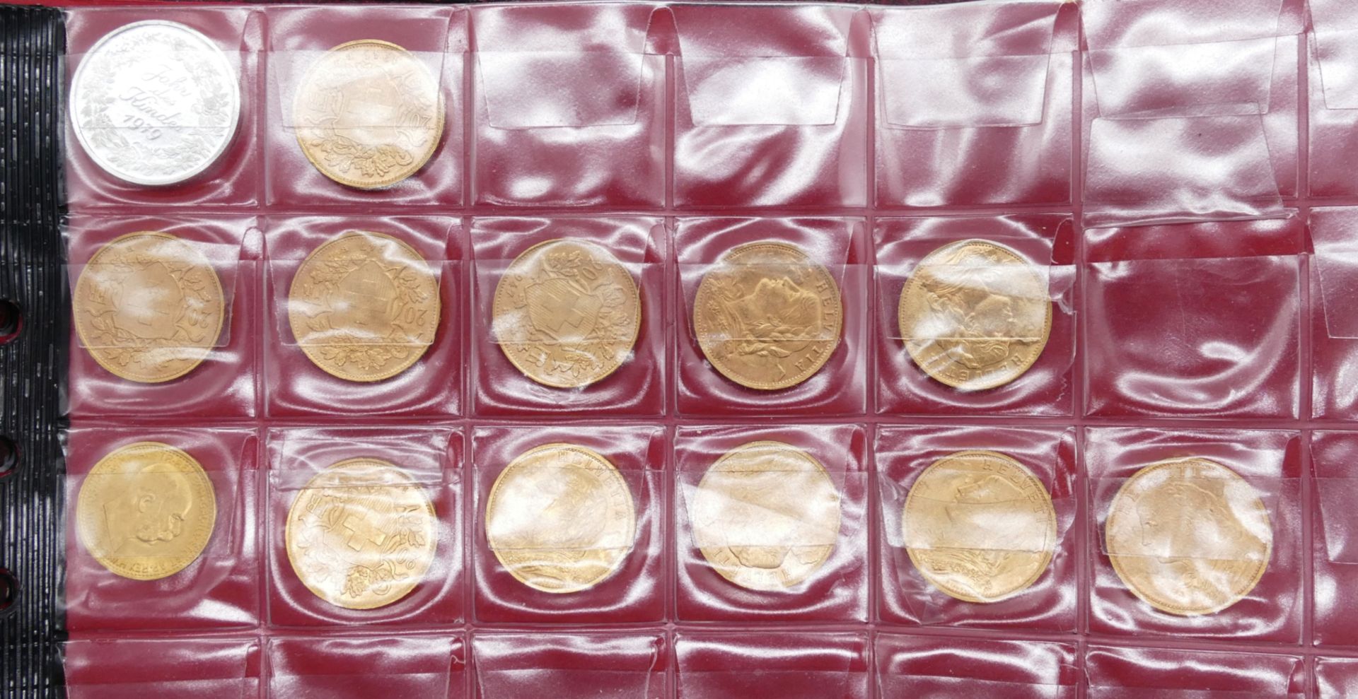 1 Konv. Münzen, je GG (ca. 12 Stück) z.B. Schweiz sowie 1 Konv. Münzen/Medaillen: Silber/Metall u.a.