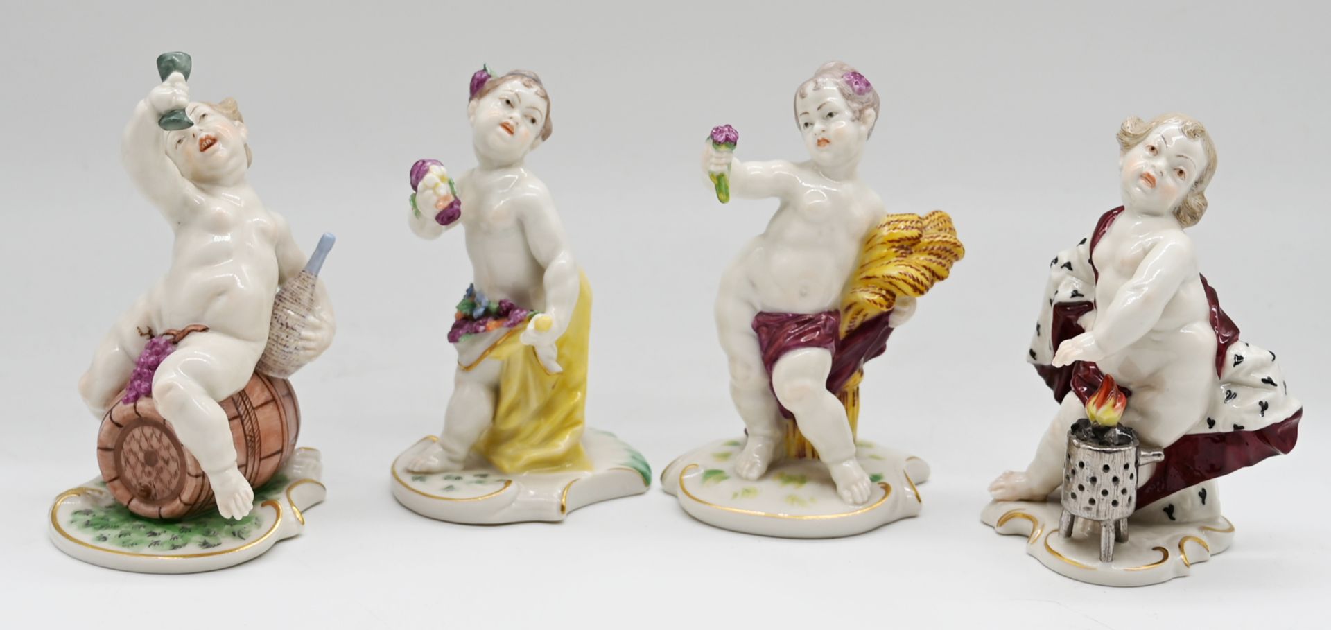 4 Figuren Porzellan NYMPHENBURG "Die vier Jahreszeiten", polychrome Bemalung, H 11cm, berieben, Asp.