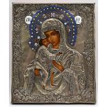 1 Ikone wohl Russland Metalloklad wohl Messing/ versilbert, "Mutter Gottes", ca. 31x26cm, Asp.