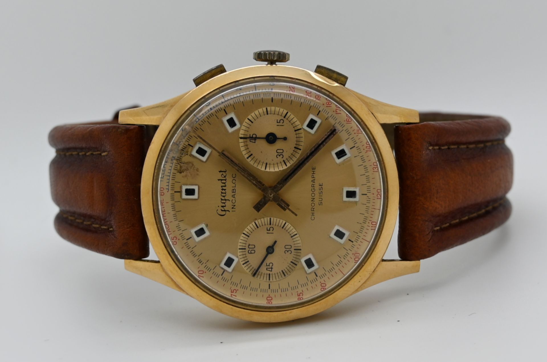 1 Herrenarmbanduhr GIGANDET, Gehäuse GG 18ct., wohl Automatik, Uhr läuft an, wohl 1940er Jahre, Lede