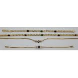 2 Sets: je Armband mit Collier, je GG 14ct., z.T. mit Brillanten bis zu ca. 0,05ct., wohl Saphire/Ru