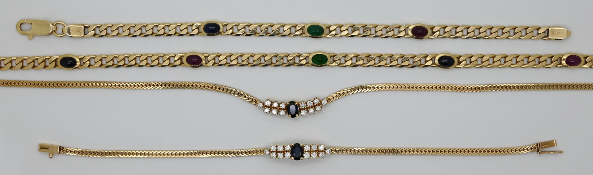 2 Sets: je Armband mit Collier, je GG 14ct., z.T. mit Brillanten bis zu ca. 0,05ct., wohl Saphire/Ru