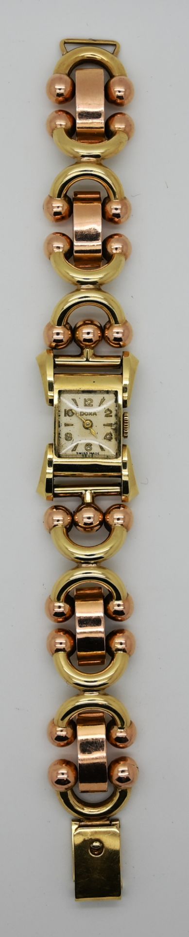 1 Damenarmbanduhr GG 14ct. (Gehäuse) DOXA, Band undeutl. gestempelt wohl GG/RG, wohl Automatik, Uhr - Bild 2 aus 2