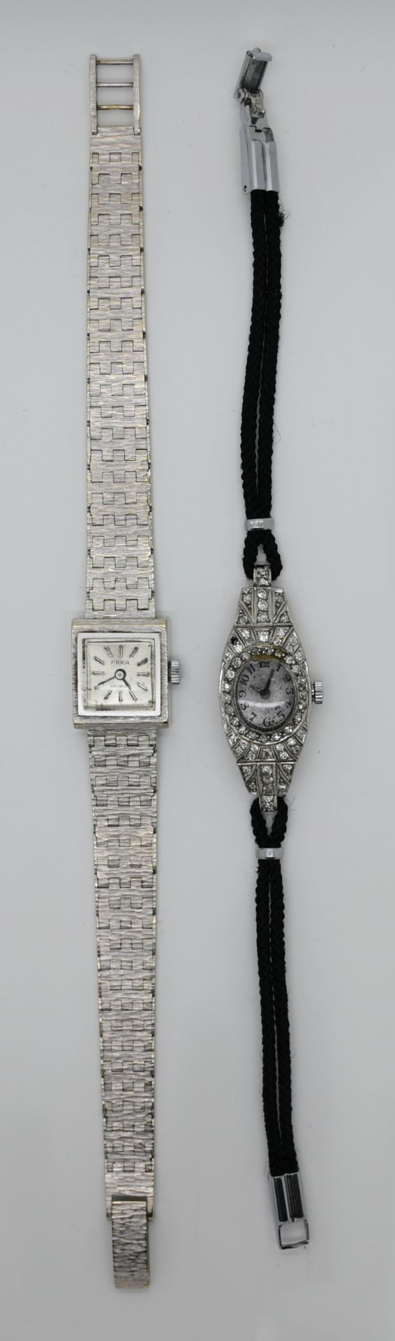 1 Damenarmbanduhr, Gehäuse Platin 950, mit Brillantbesatz (1 Stein fehlt), Glas besch., Textilband u - Bild 2 aus 2