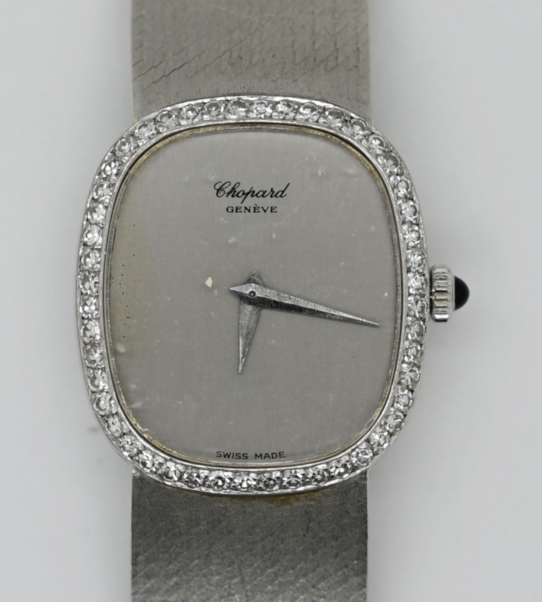 1 Damenarmbanduhr CHOPARD WG 18ct., Handaufzug, Uhr läuft an, Brillantkranz je ca. 0,02ct., Tsp., Or