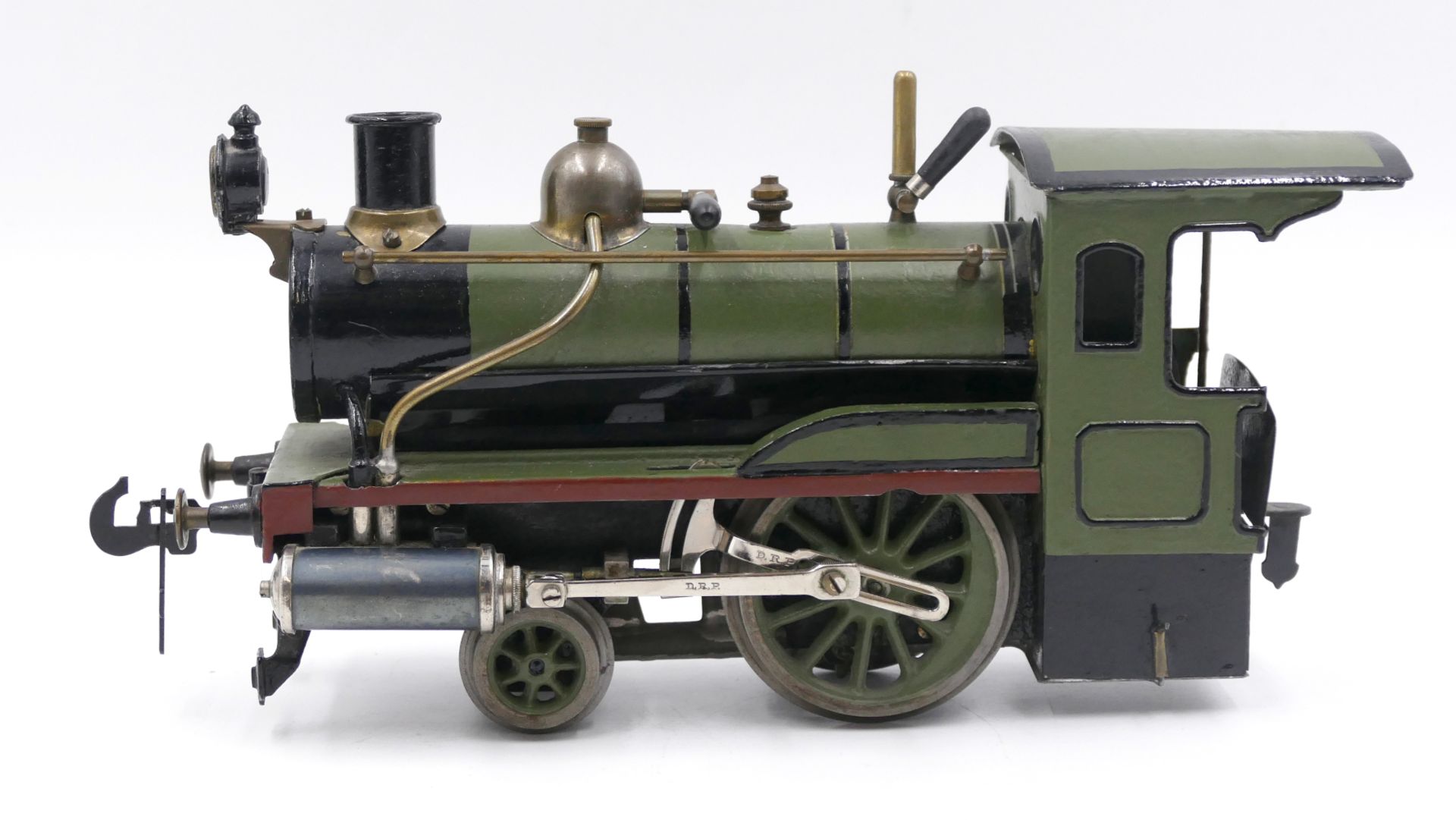 1 Dampflokomotive mit Spiritusantrieb wohl Georges CARETTE Nürnberg, Anfang 20. Jh., grün-schwarz be