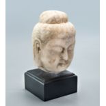 An Alabaster Buddha Head, China, Tang Dynasty (618-907)