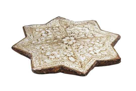 A COPPER LUSTRE-PAINTED KASHAN-REVIVAL STAR-SHAPED POTTERY TILE Iran, 18th - 19th century - Image 2 of 26