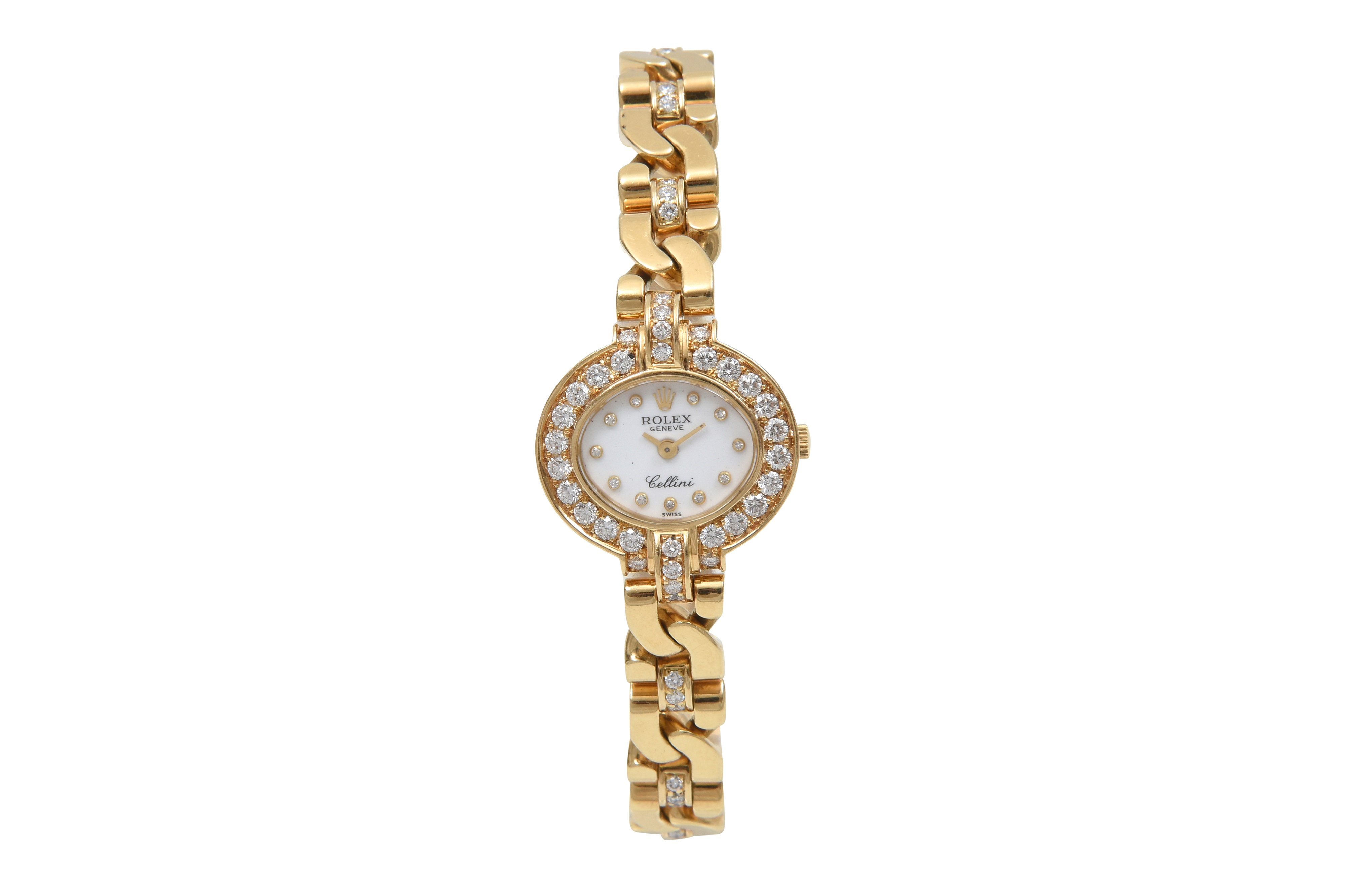 AN ELEGANT ROLEX LADIES 18K YELLOW GOLD WITH DIAMOND SET MANUAL CHAIN BRACELET. CELLINI DIAMOND SET 