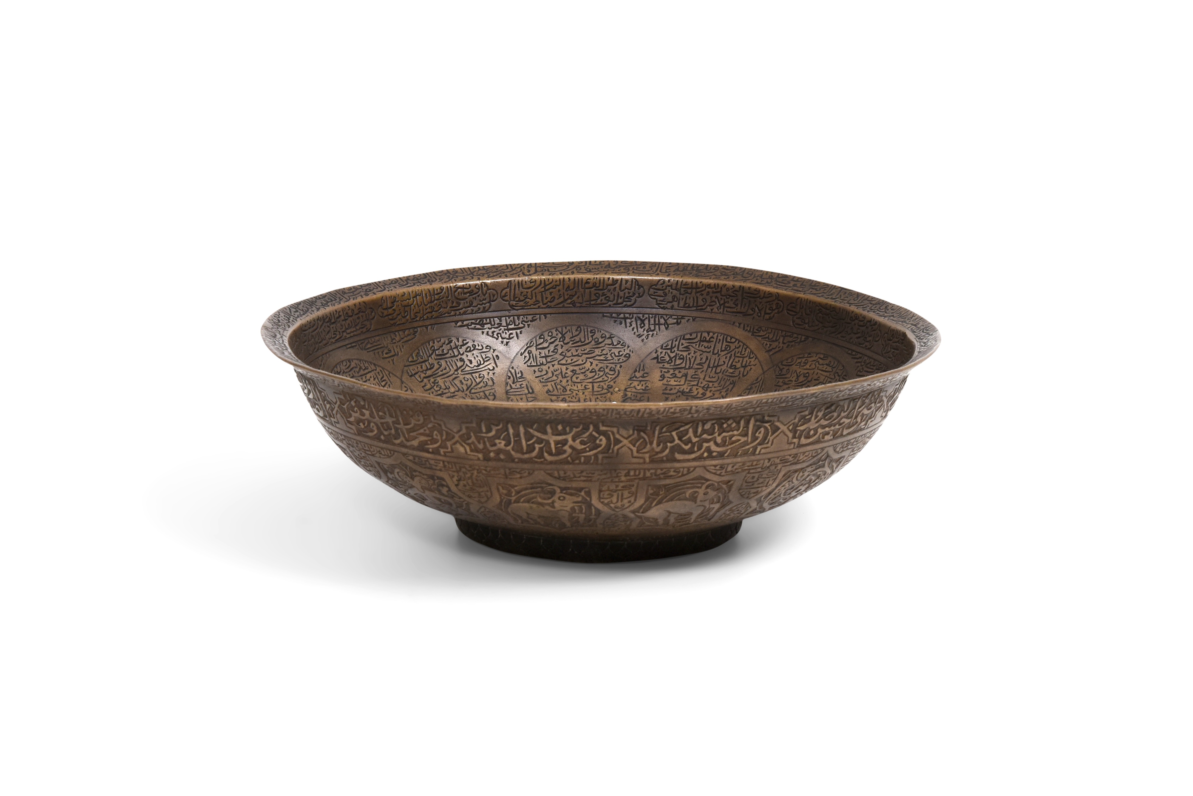 AN ENGRAVED BRASS DIVINATION BOWL WITH ZODIAC SIGNS Safavid Iran, 17th century