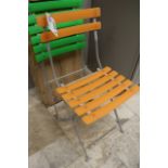 2 sets of metal framed orange & green poly chairs