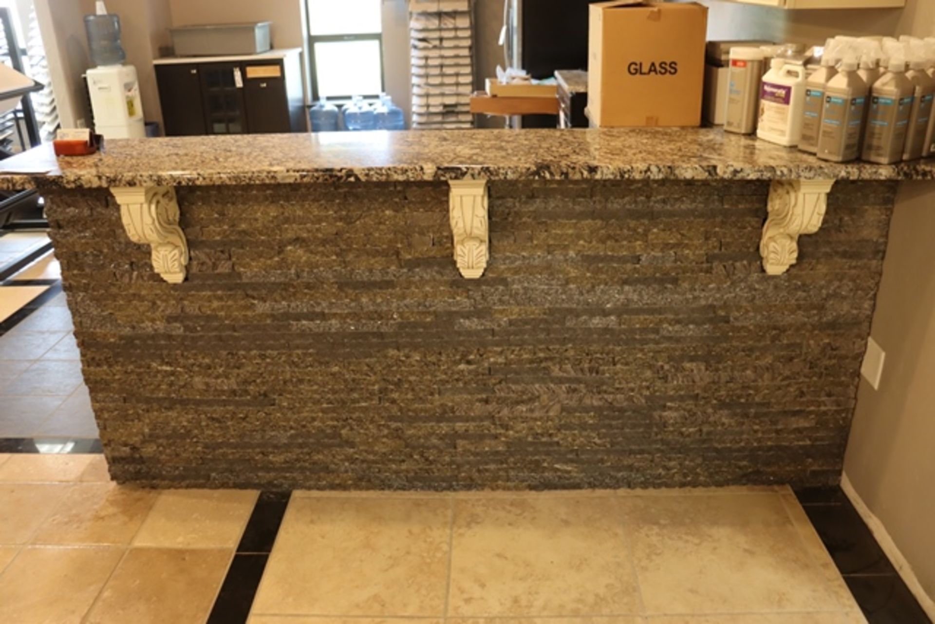 18" x 90" x 42" tall stone front bar with granite top