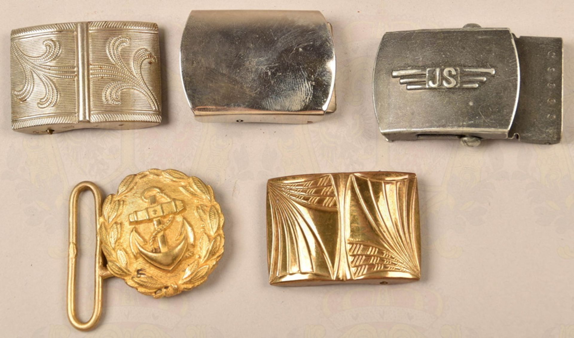 4 civilian belt buckles and 1 dagger buckle