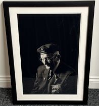 Framed portrait black and white photograph of Normandy Veteran Robert Purver. Size overall including