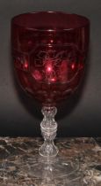 A 19th century cranberry glass oversized wine goblet, star-cut base, 23.5cm high, dated May 18th