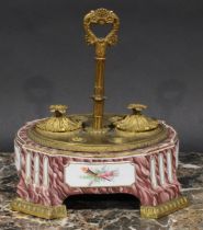 A Continental gilt metal mounted porcelain encrier or inkstand, posted handle, acanthus cast covers,