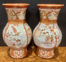 A pair of Japanese Kutani baluster vases, typically decorated with Geishas in a landscape, 34cm