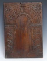 A 17th century oak panel, carved with an architectural arch, 46cm x 31cm, c.1680