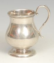 A 19th century Russian silver baluster christening mug, quite plain, scroll handle, domed circular