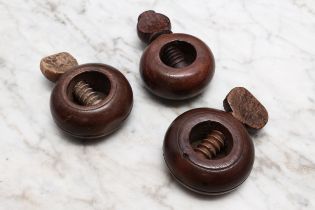 Nutcrackers - a 19th century boxwood ring shaped screw-action pocket nut cracker, 5cm diam;