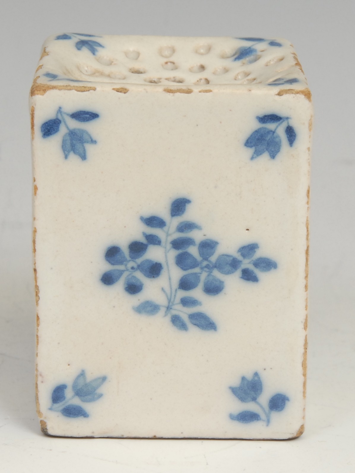 An 18th century Delft square pounce pot, painted in tones of blue with scattered floral sprigs, - Image 3 of 5